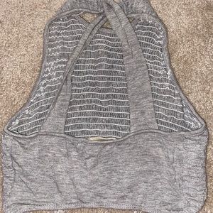 cropped tank with a cross in the back